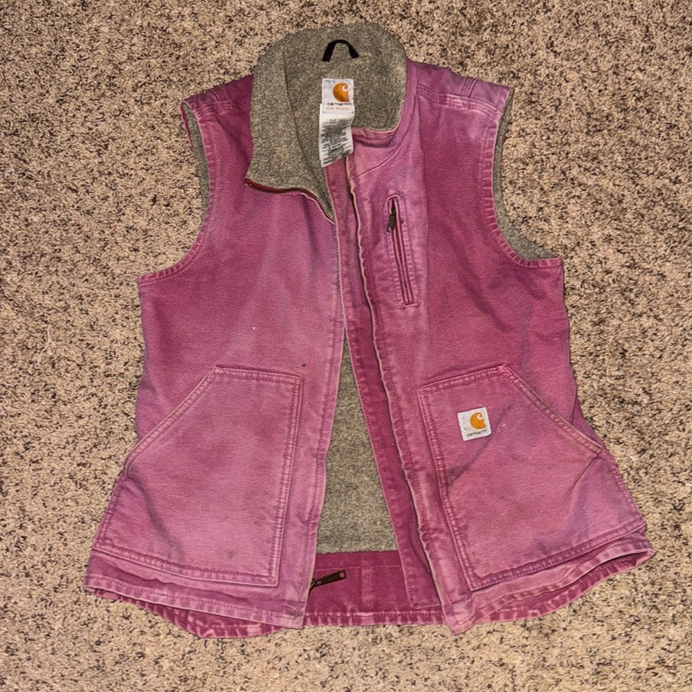Pink worn in vest